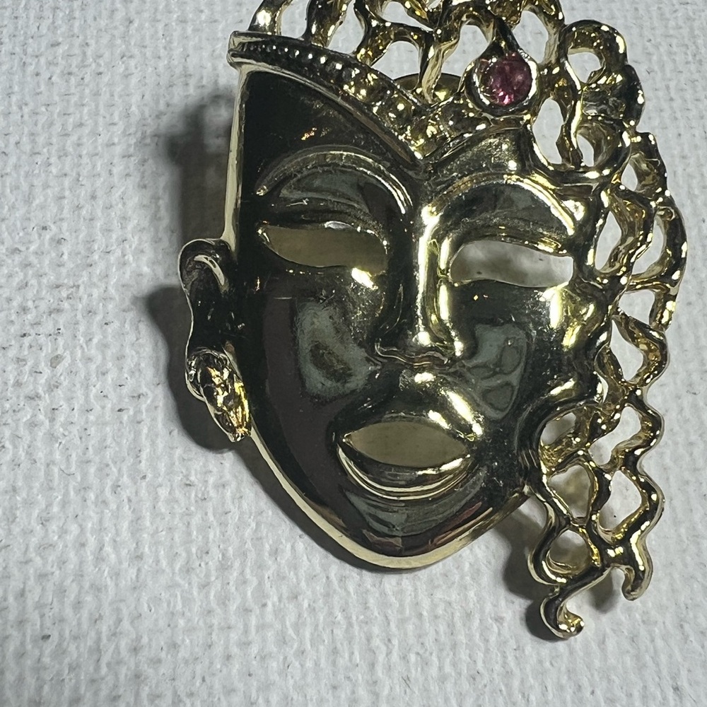 Artistic Gold and Black Face Brooch